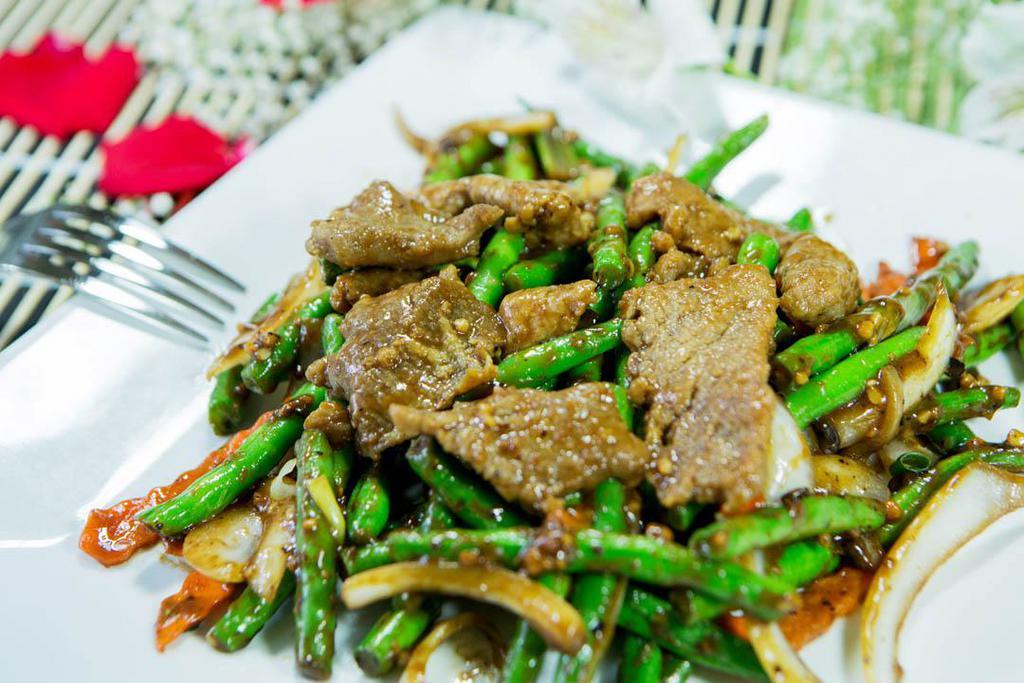Green Bean Beef · Beef sauteed with fresh green beans in special black bean sauce. Served with steamed rice.