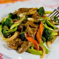 Beef Broccoli · Sliced beef stir fried with fresh broccoli in flavorful brown sauce. Served with steamed rice.