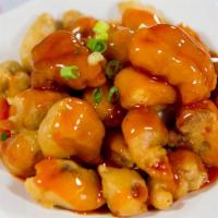 Sweet and Sour Pork · Pork diced dipped in a light batter and fried. Served with sweet and sour sauce. Served with...
