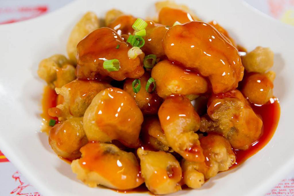 Sweet and Sour Pork · Pork diced dipped in a light batter and fried. Served with sweet and sour sauce. Served with steamed rice.