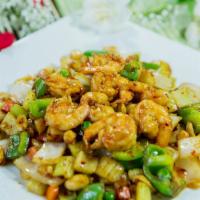 Kung Pao Shrimp · Shrimp stir fried with fresh onions, green peppers, carrots and peanuts in spicy sauce. Serv...