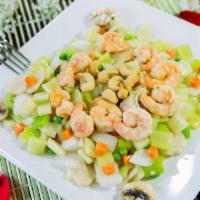 Cashew Nut Shrimp · Shrimp stir fried with fresh celery, mushrooms, water chestnuts, onions, peas, carrots and t...