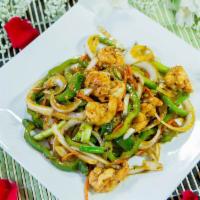 Szechuan Shrimp · Shrimp stir fried in onions, green peppers and carrots in spicy Szechuan sauce. Hot and spic...