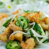Spicy Salted Shrimp · Lightly breaded shrimp sauteed with green onions, white onion and jalapeno. Served with stea...