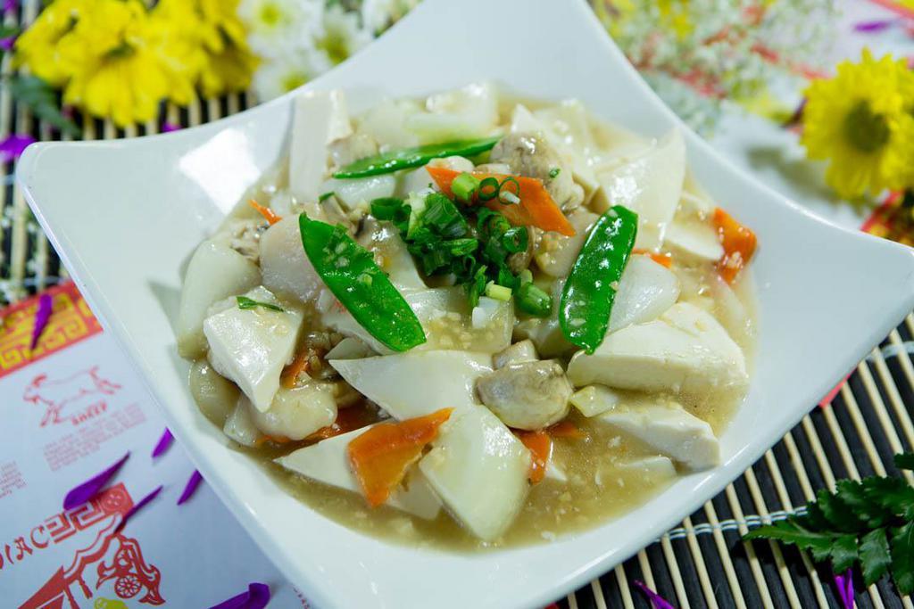 Tofu with Garlic Sauce · Served with steamed rice. Vegetarian.