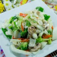 Vegetable Combination · Large cut snow peas, carrots, celery,  water chestnuts and broccoli. Served with steamed ric...