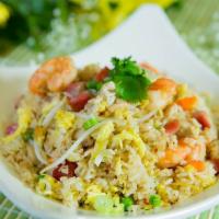 Yang Chow Fried Rice · Served with BBQ pork, chicken, shrimp with vegetables.