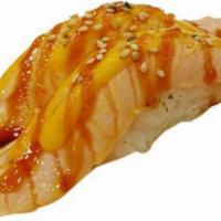 2pc Seared Salmon Nigiri · * Consuming raw or uncooked meats, poultry, seafood, shellfish, or eggs may increase your ri...