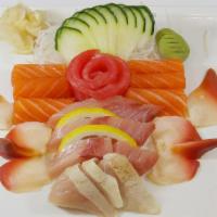 Deluxe Sashimi Combo Plate · 15 pieces of assorted raw fish.