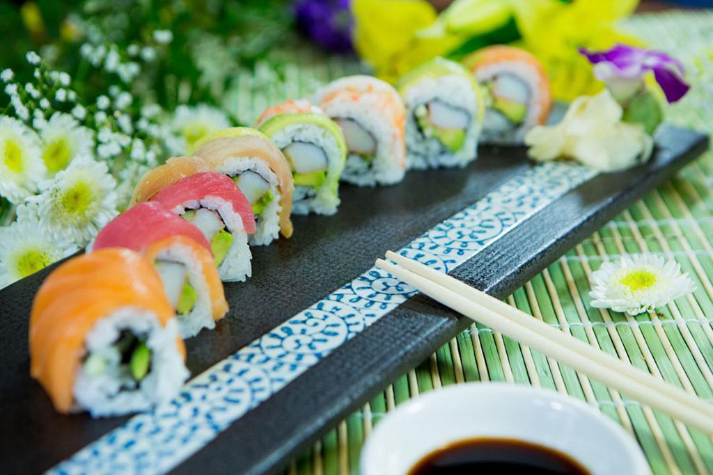 8 Pieces Rainbow Roll · 4 kinds of chef choice fish, 1 shrimp top on California roll. Contains raw fish.