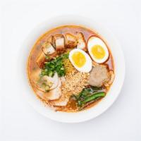 7. Ba-Mhee Tom-Yum · Egg noodle in spicy hot and sour soup, with five spice pork loin, crispy pork belly, whole s...