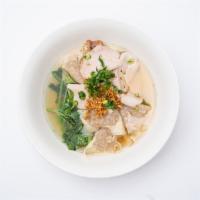 9. Dumpling Soup · Pork dumplings (8) soup, five spice pork loin, and yu-choi.