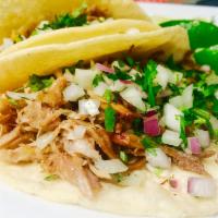 tacos · three corn tortilla filled with your choice of meat, topped with onions & cilantro. limes, r...