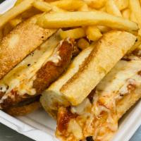 Chicken Parmigiana Sandwich · Served with french fries. 