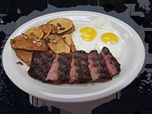 Steak and Eggs Breakfast Special · Grilled sirloin steak with 2 eggs done your way, served with a side and a bagel with cream cheese.