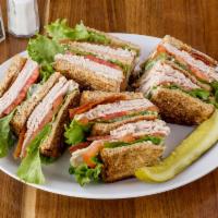 Triple Decker Sandwich · Turkey, bacon, lettuce, tomato and mayo on toasted wheat bread. 