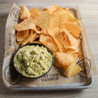 Chips & Guac · Fresh Avocado, Garlic, Onion, topped with Diced Tomato, Red Onion, Queso Fresco, and Chopped...