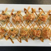 Nacho Roll · Avocado, crab meat, cream cheese, and jalapeno served fried topped with spicy crab with spic...