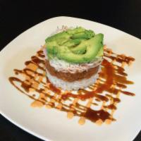 Ahi Tower Roll · Rice, crab meat, spicy tuna, and avocado with spicy mayo, eel sauce, and Sriracha.