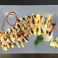 Facebook Roll · Cucumber tempura shrimp topped with crab meat topped tempura soft shell crab and avocado wit...