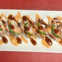 Florida Roll · Spicy tuna, cream cheese, and shrimp tempura topped with crab meat and jalapeno with spicy m...