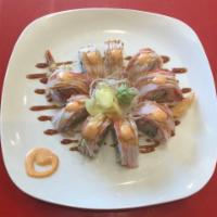 Sunrise Roll · Tempura shrimp, avocado, and crab meat topped crab stick with spicy mayo, and eel sauce.