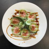 Lollipop Roll · Salmon avocado crab meat, and wrapped in cucumber with eel sauce.