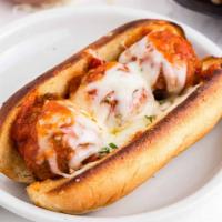 Harry Caray Sandwich · Beef meatball with marinara sauce, red onions, and provolone cheese, served with chips. 