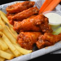Chicken Wings · Choice of sauce. Served with ranch dressing and veggies.
