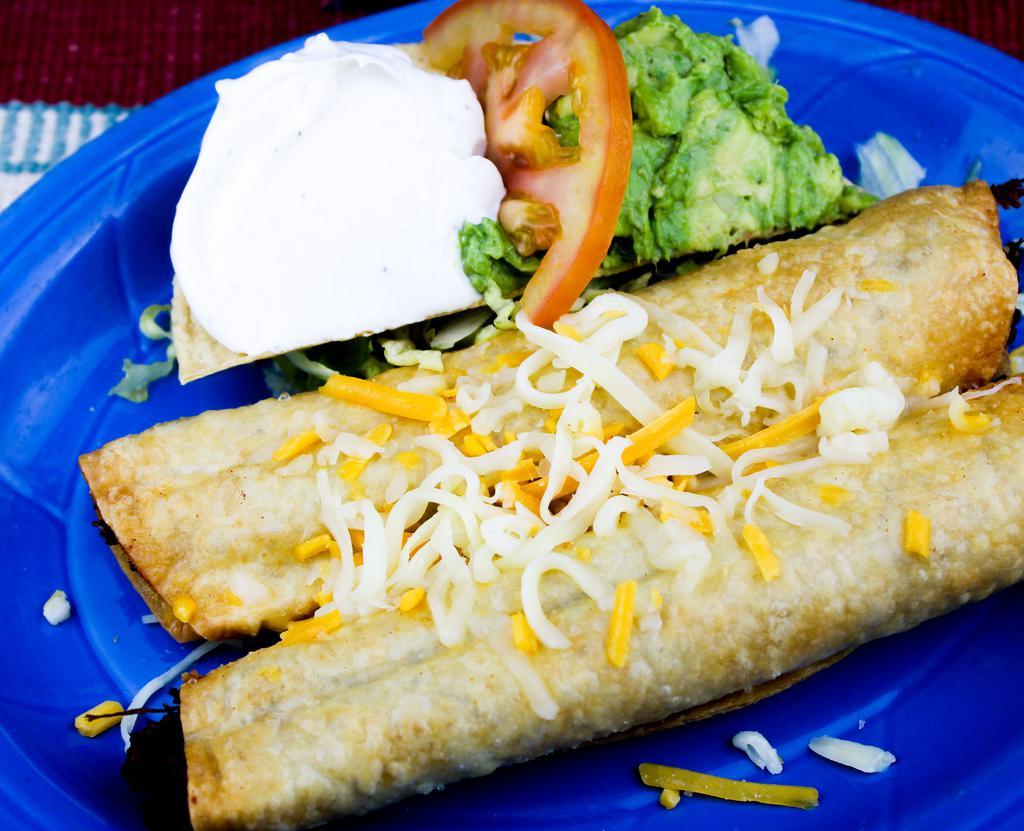 “Los Dos” Flautas Dinner · A la carte. 2 flautas with your choice of shredded beef or chicken wrapped in a flour tortilla, cheese and deep fried with sour cream and guacamole. Add rice and beans for an additional charge.