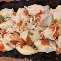 6 Stuffed Shells · (6) Homemade pasta shells stuffed with herbs & ricotta cheese smothered with marinara sauce