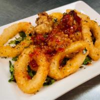 Calamari · Fresh squid lightly battered, quickly fried and tossed in a sweet chili sauce.