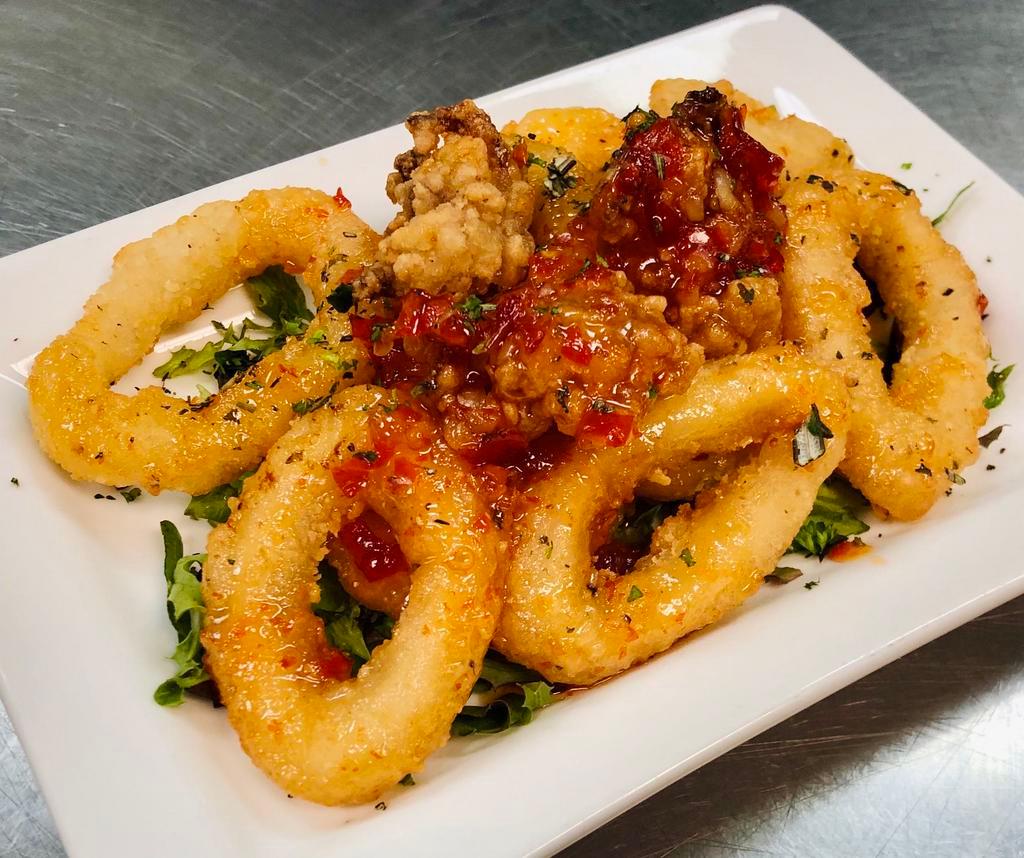 Calamari · Fresh squid lightly battered, quickly fried and tossed in a sweet chili sauce.
