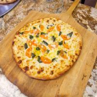 Margarita Pizza · Sliced tomatoes, fresh basil, garlic, mozzarella cheese and olive oil.