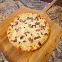 Alfredo Pizza · Chicken, mushrooms, Parmesan and mozzarella cheese.