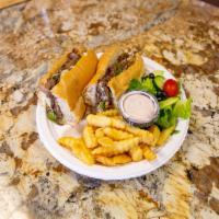 Philly Steak Sub Sandwich · Served with steak, mushrooms, onions, green peppers and mozzarella cheese.