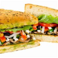 Mediterranean Veggie Sandwich · Our signature gourmet cheese blend, feta crumbles, fresh mushrooms, onions, green and red pe...