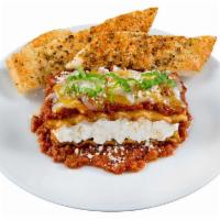 Baked Lasagna · With meat sauce, tomato vegetarian sauce or Alfredo sauce. Includes personal garlic bread an...
