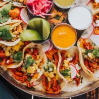 Taco Package for 4 · Your Choice of 12 Tacos (Chicken Tinga, Hanger Steak, Veggie, Marinated Grilled Chicken) + A...
