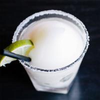 De La Casa Margarita · Blanco tequila, simple, fresh lime
(available rocks or frozen + pitcher size available)
