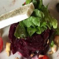 Beet Salad · Oven roasted fresh beets, diced apple, toasted pine nuts and brie cheese. Gluten free.