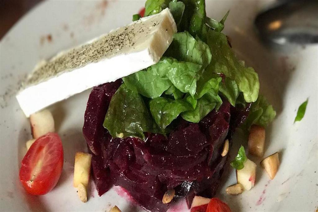 Beet Salad with Brie Cheese · Oven-roasted fresh beets, diced apple, pine nuts, and Brie.