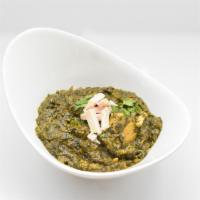 Chicken Saag · Boneless chicken cooked with spinach and spices.