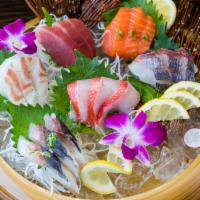 12 Piece Sashimi Platter · 6 different kinds of premium fish, 12 pieces.