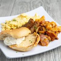 2 Eggs Any Style with Sausage Breakfast · Served with potatoes, grits, oatmeal or tomato. Choice of bread.
