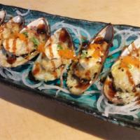 Baked Mussels · 6 pieces. Baked in garlic sauce and cream cheese topped with sauce, scallions, masago and se...