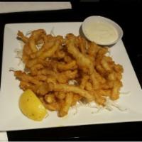 Crispy Calamari · Deep fried strips of calamari served with basil sauce.