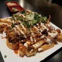 loaded Fries · House made pulled pork, top with yellow onion, celantro, spicy and garlic mayo