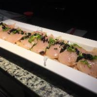 Pepperfin · 8 pieces of thinly sliced albacore in ponzu topped with wakame, jalapenos, tobiko and sauce.