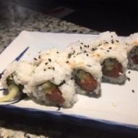 Spicy Tuna Roll · Cucumber and spicy tuna top with sesame seeds.